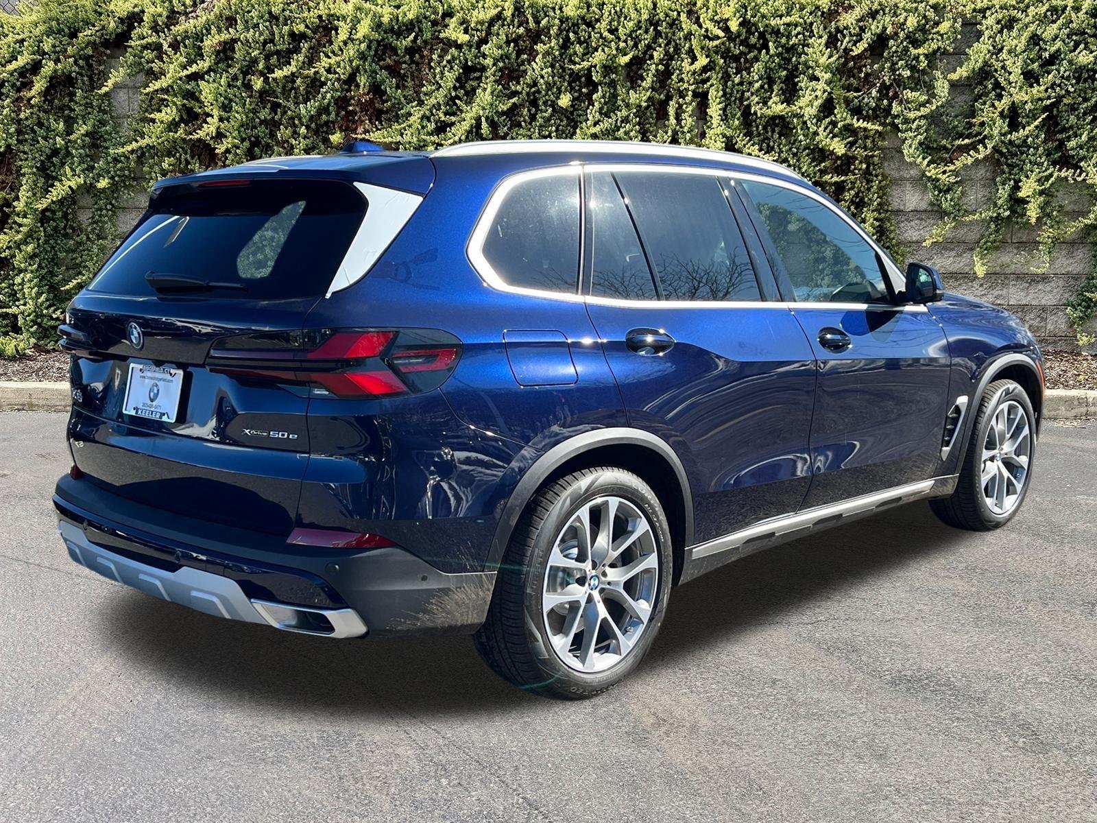 New 2026 Tanzanite Blue II Metallic BMW xDrive50e image 2