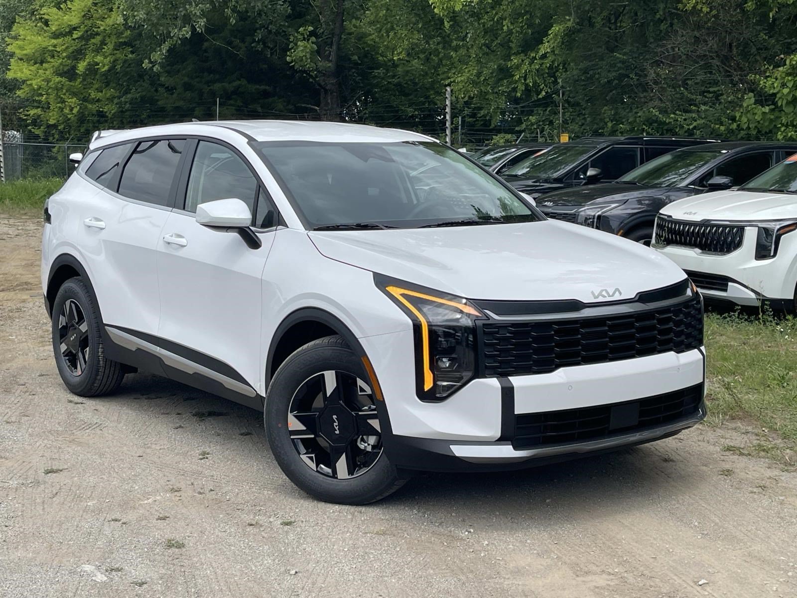 New 2026 Glacial White Pearl Kia LX image 1