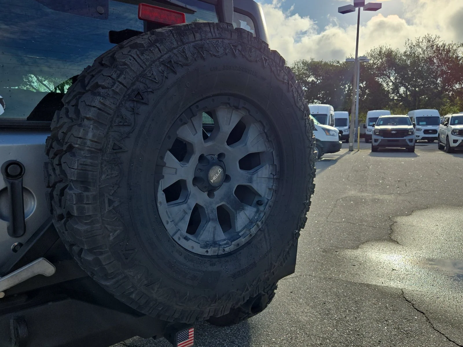 Used 2015 Billet Silver Metallic Clearcoat Jeep Sport image 14