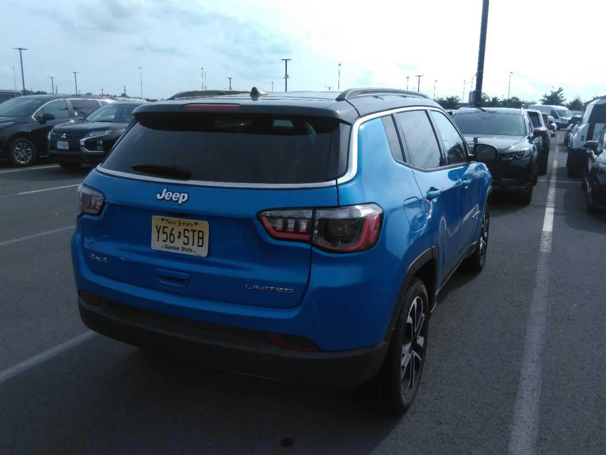 Used 2024 Blue Jeep Limited image 3