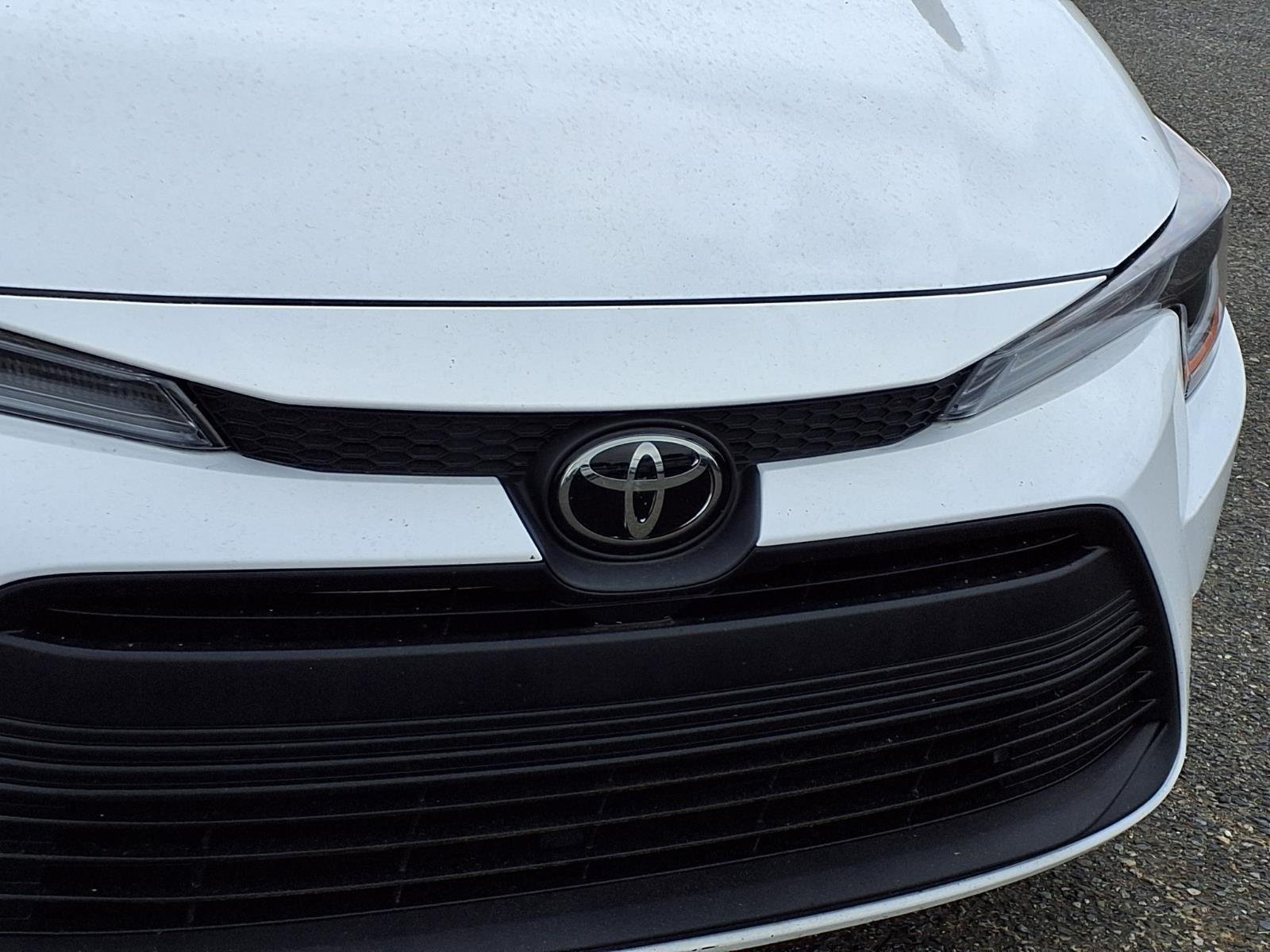 Used 2024 Midnight Black Metallic Toyota LE image 13