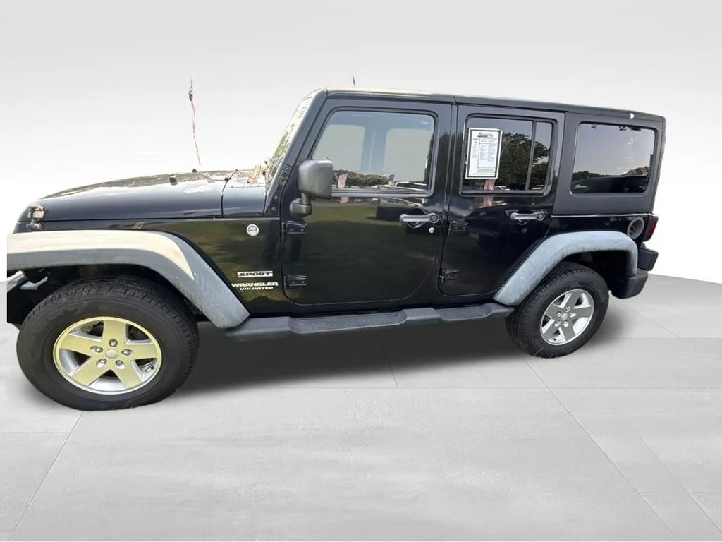 Used 2012 Black Jeep Unlimited Sport image 2