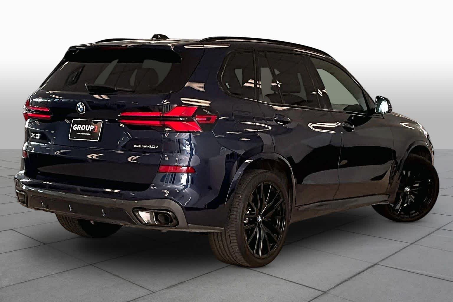 Used 2024 Tanzanite Blue II Metallic BMW sDrive40i image 12