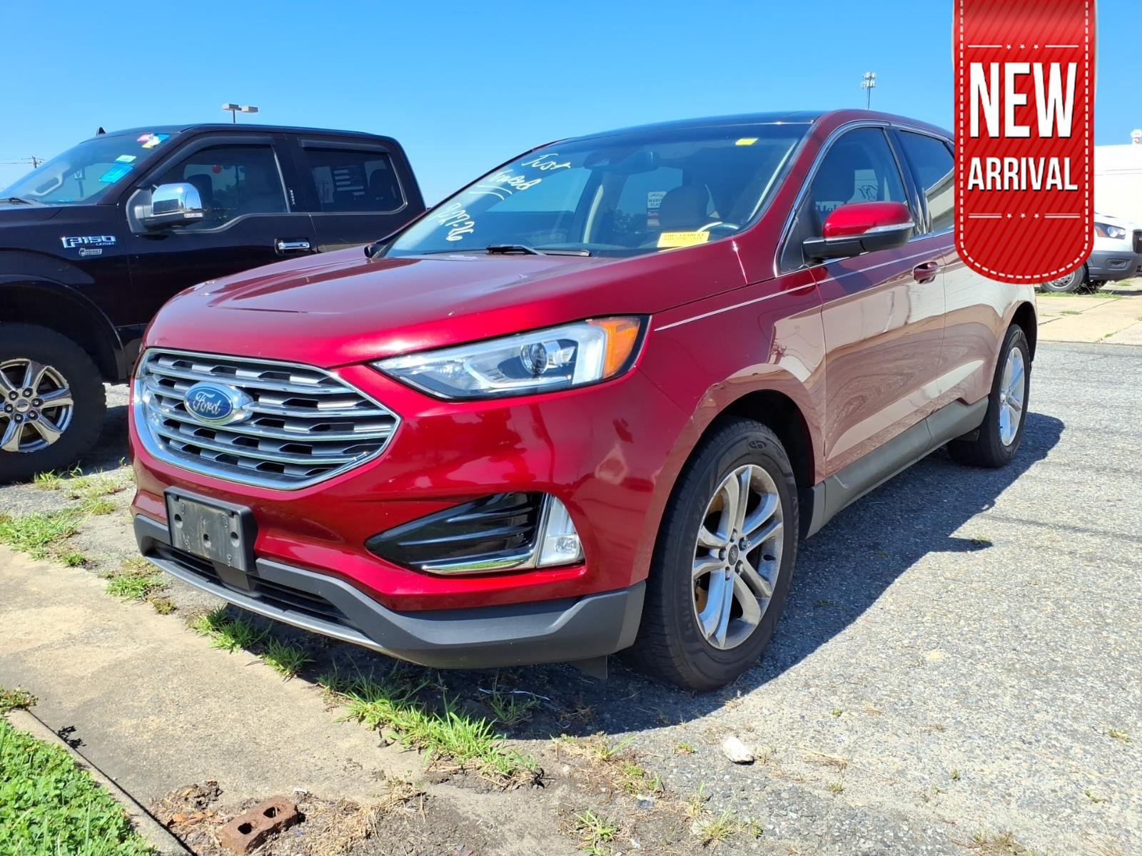 Used 2019 Ruby Red Metallic Tinted Clearcoat Ford SEL image 1