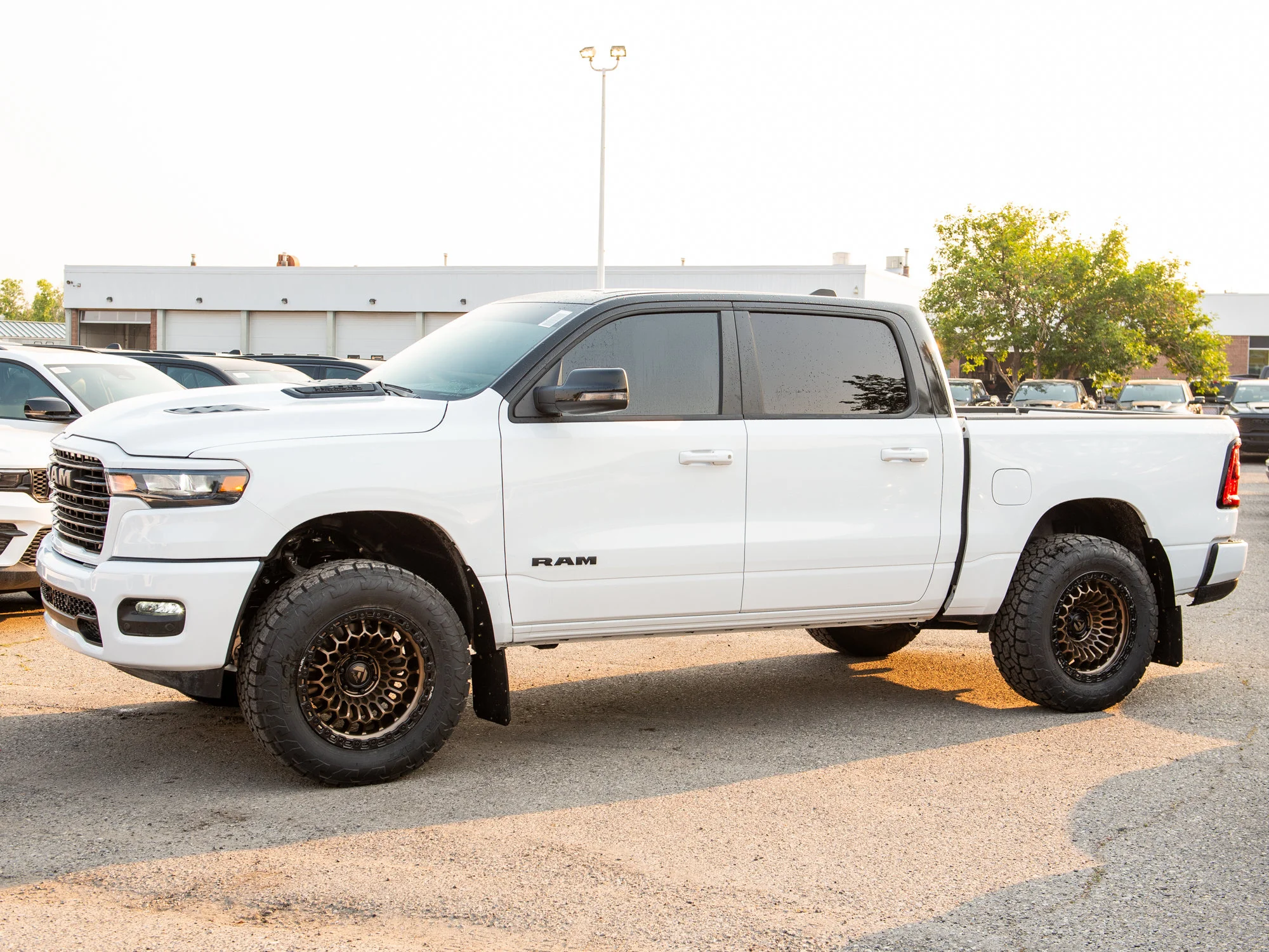 New 2026 White RAM Sport* 4x4 Crew Cab, 3.5 Inch Lift, 35 Inch Tires, Fuel Wheels image 2