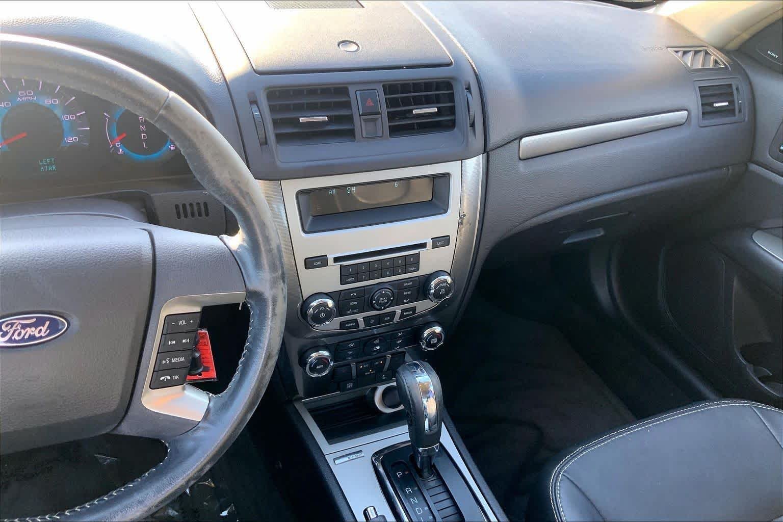 Used 2011 Red Candy Metallic Tinted Ford SEL image 6