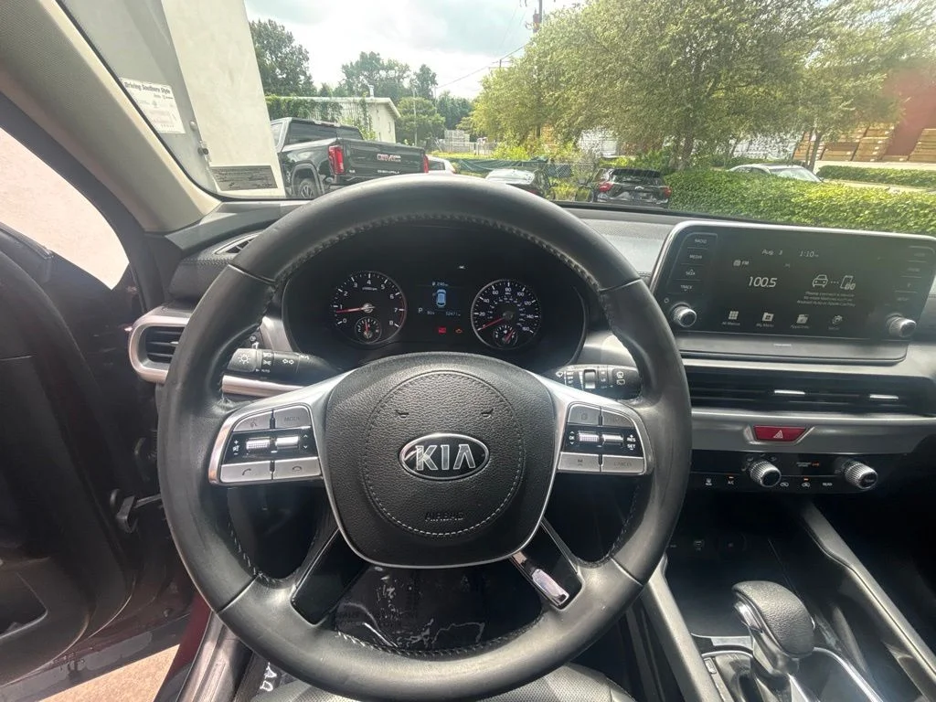 Used 2021 Purple Kia LX image 13