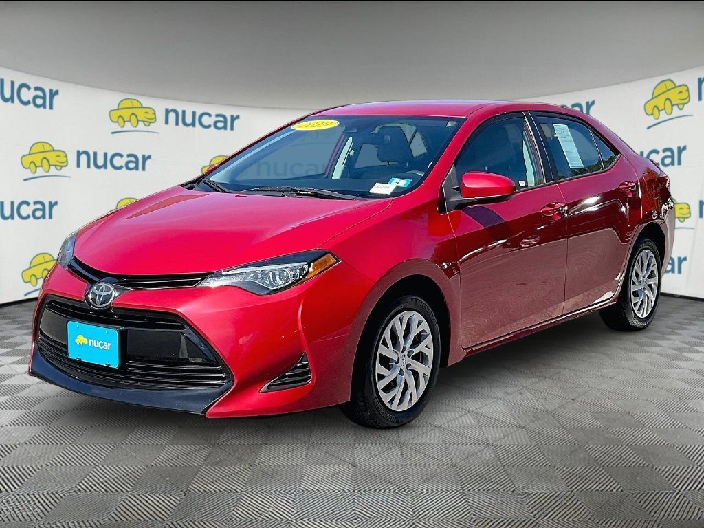 Used 2019 Red Toyota LE image 3