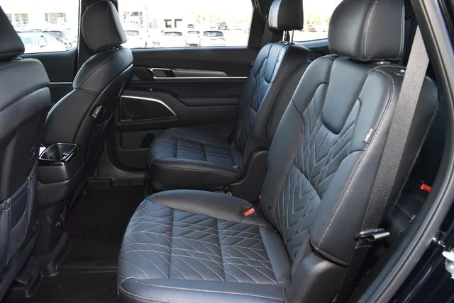 Used 2025 Ebony Black Kia SX X-Line image 11
