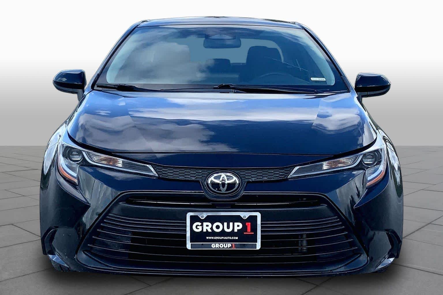 Used 2023 Midnight Black Metallic Toyota LE image 4