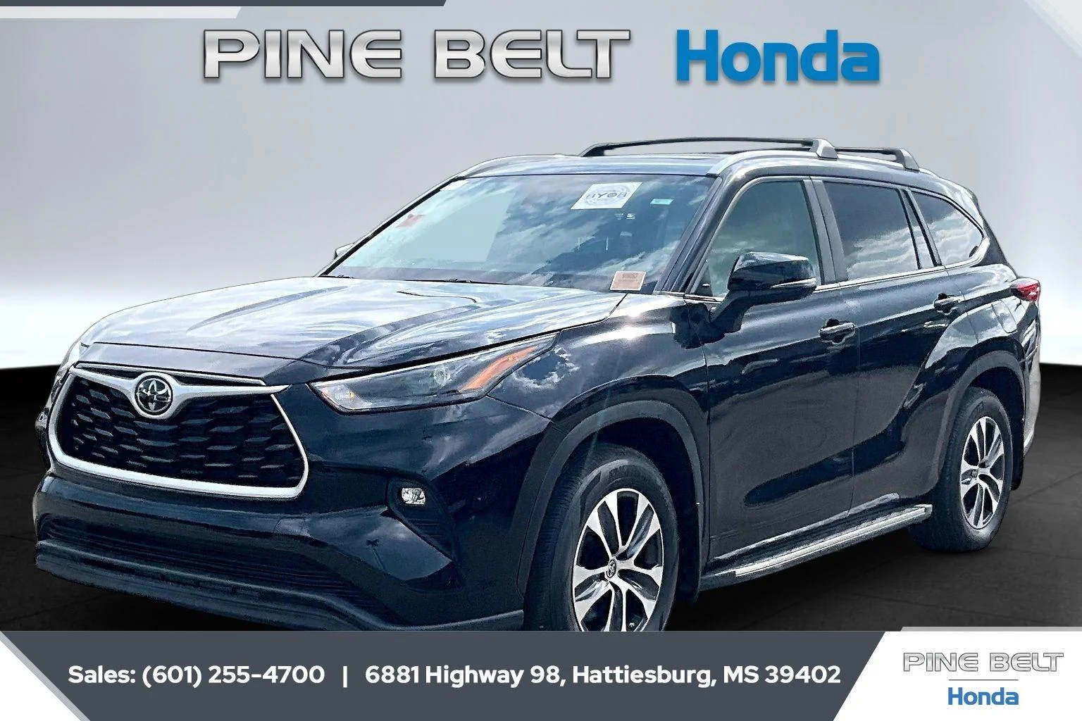 Used 2023 Midnight Black Metallic Toyota XLE image 1