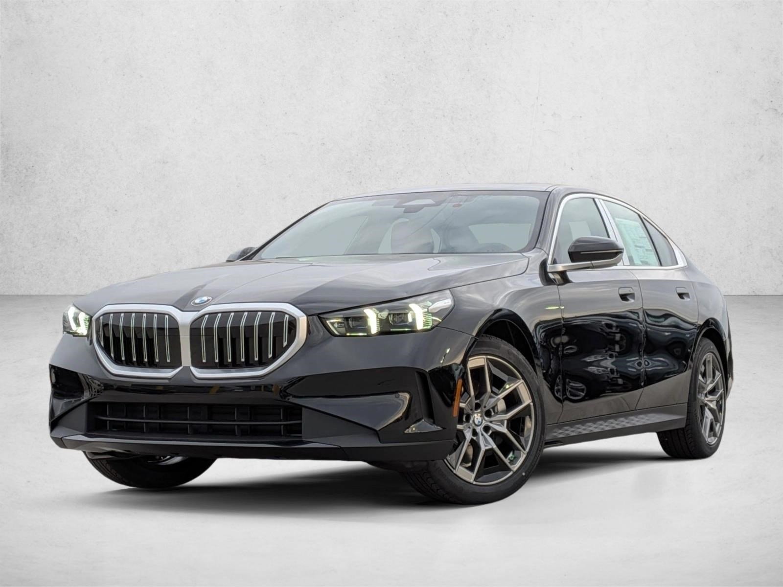 Used 2026 Black Sapphire Metallic BMW 530i xDrive image 1