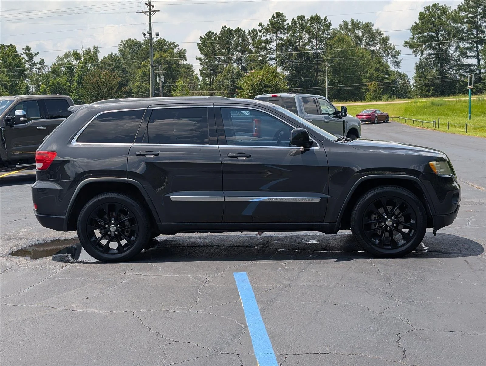 Used 2011 Black Jeep Laredo 2WD image 6