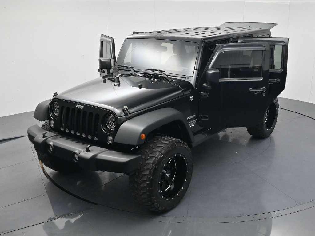 Used 2014 Black Clearcoat Jeep Unlimited Sport image 54