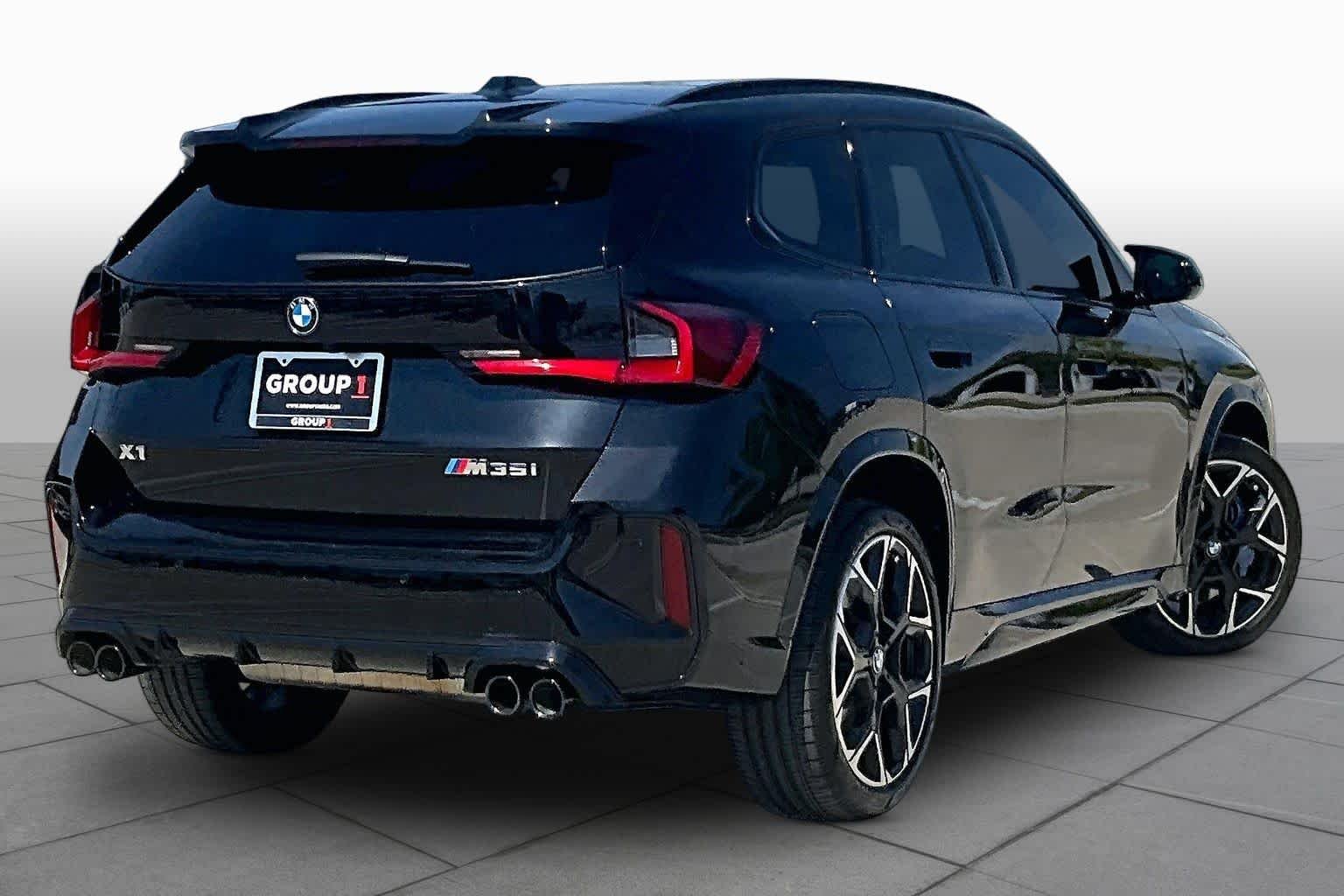 Used 2026 Black Sapphire Metallic BMW M35i image 12