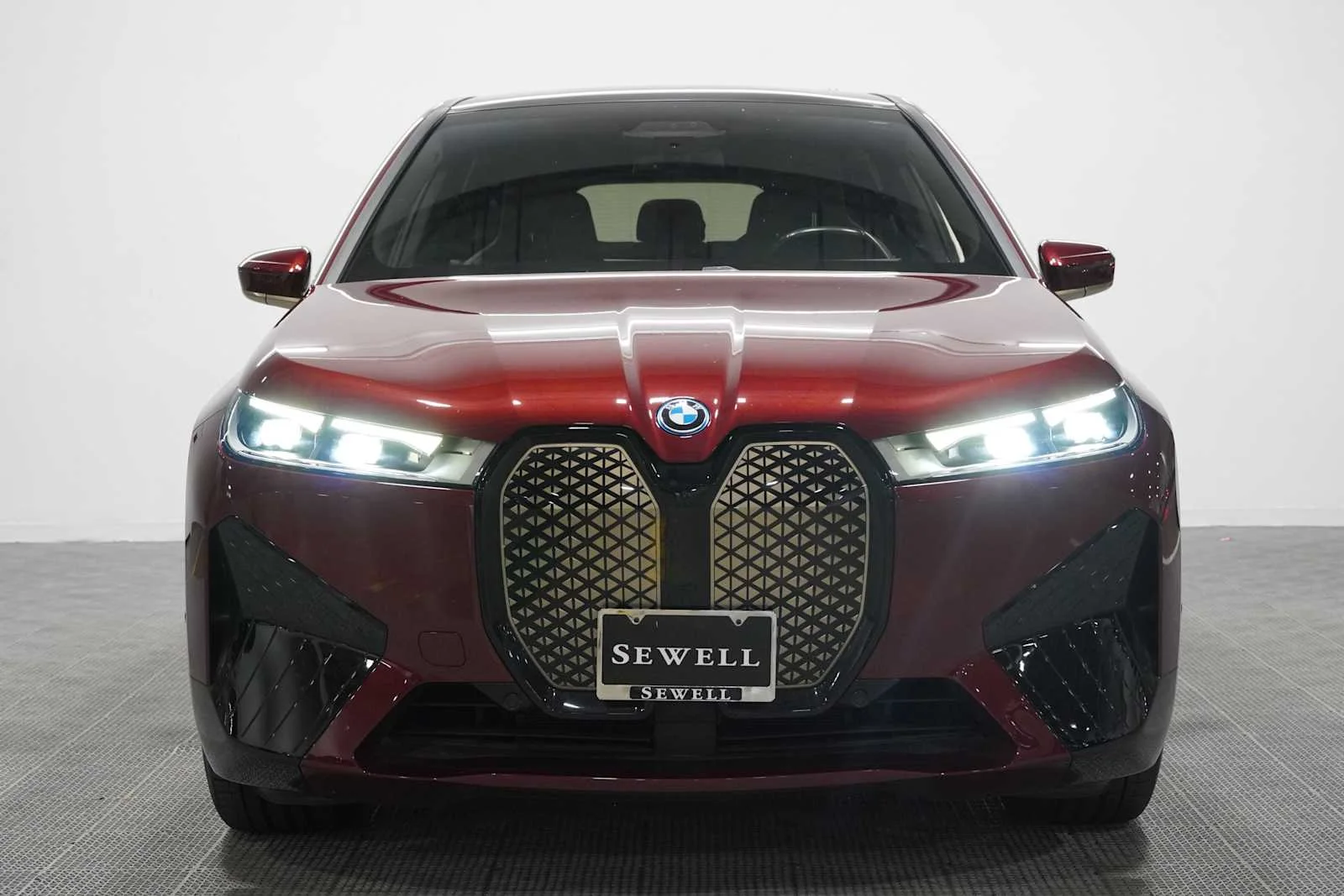 Certified Used 2024 Aventurin Red Metallic BMW xDrive50 image 2