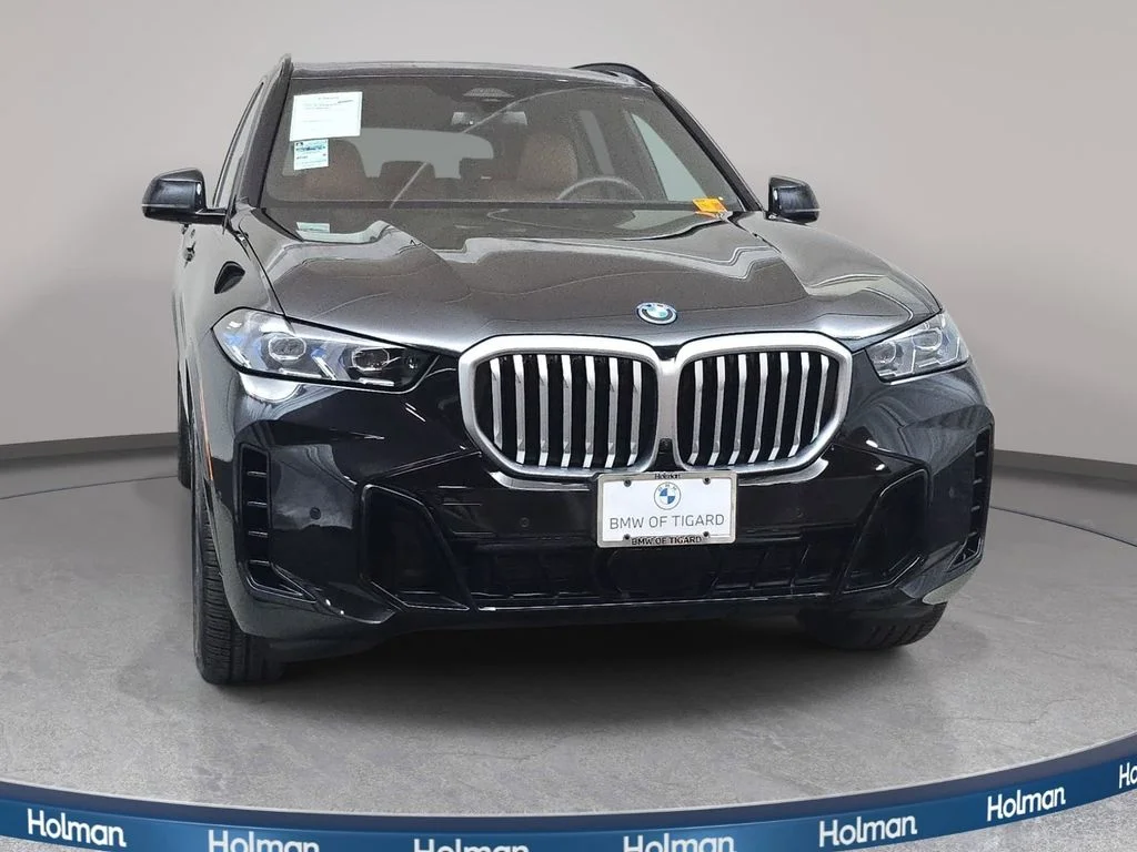 Used 2026 Black Sapphire Metallic BMW xDrive50e image 3