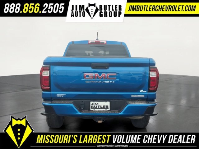Used 2023 DYNAMIC BLUE METALLIC GMC 4WD Elevation image 21