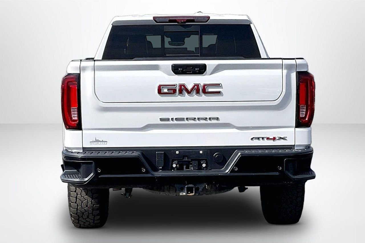 Used 2024 Summit White GMC 4WD Crew Cab Short Box AT4X image 7