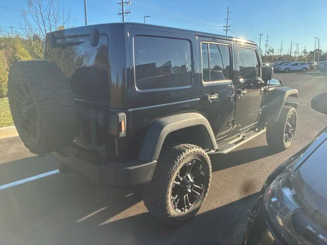 Used 2015 Black Jeep Unlimited Sport image 7