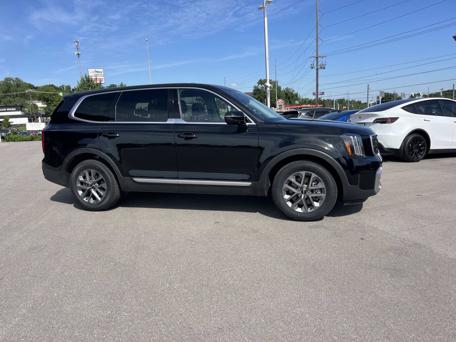 Used 2024 Ebony Black Kia LX image 2