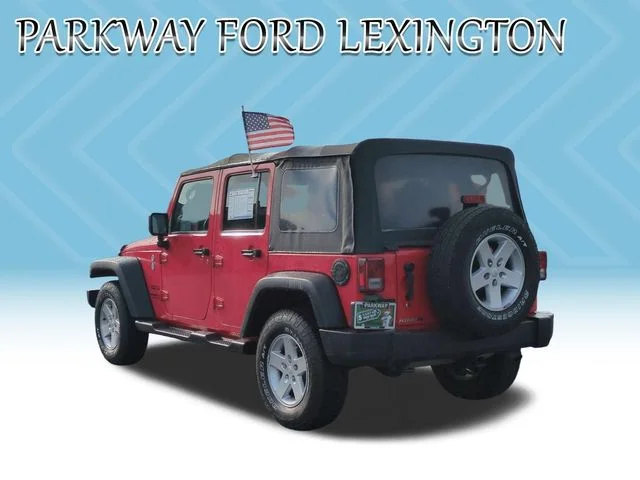 Used 2016 Red Jeep Unlimited Sport image 3