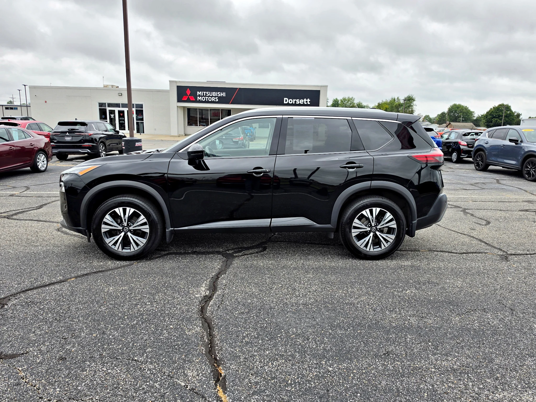 Used 2021 Super Black Nissan SV image 9