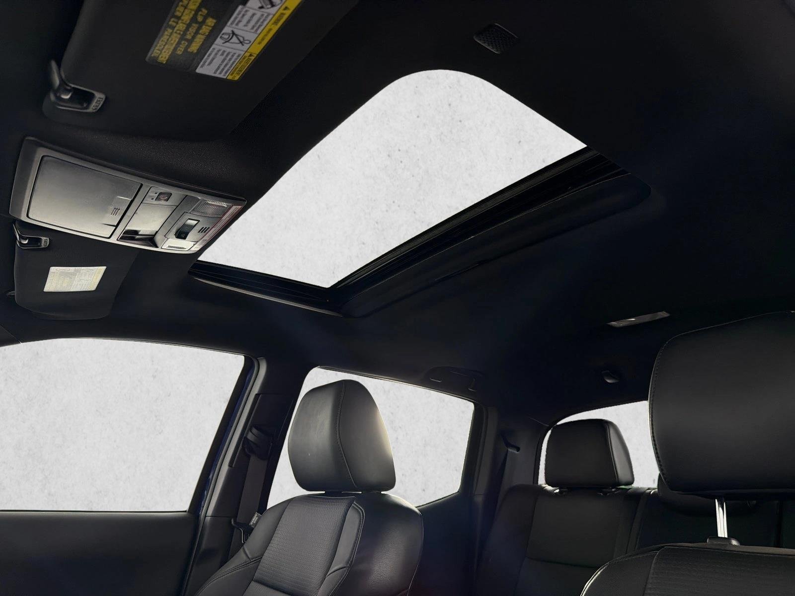 Used 2023 Blue Crush Metallic Toyota TRD Sport image 2