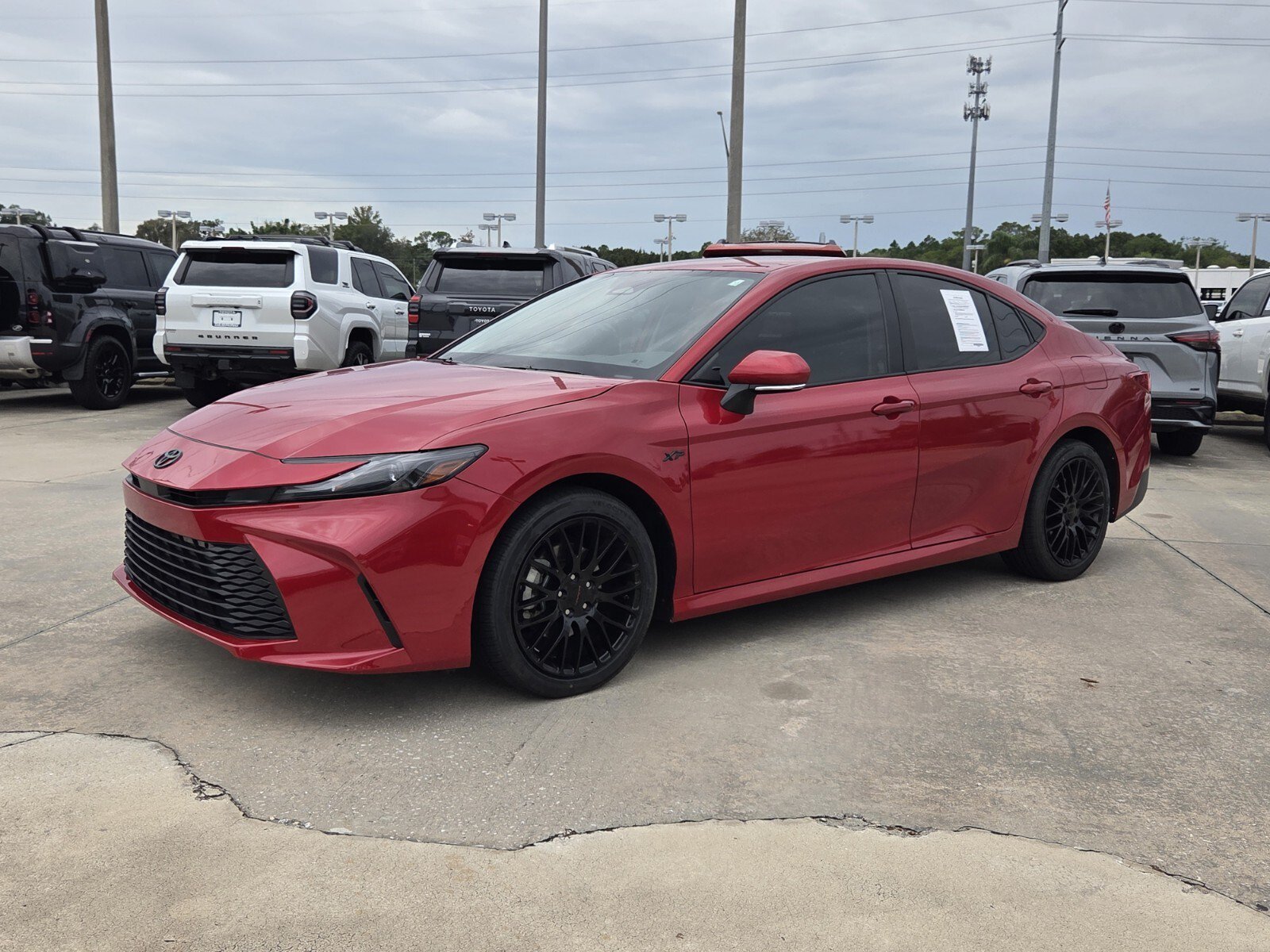 Used 2025 Red Toyota LE image 2