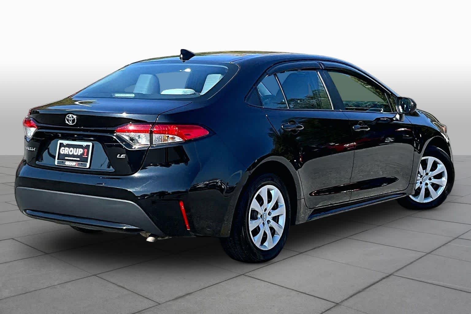 Used 2022 Black Sand Pearl Toyota LE image 13
