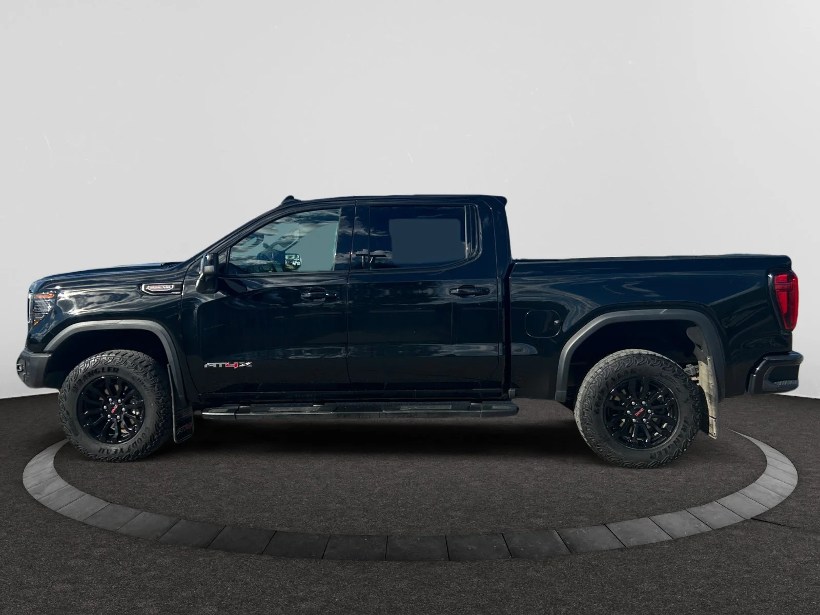 Used 2023 Black GMC AT4X Crew Cab image 2
