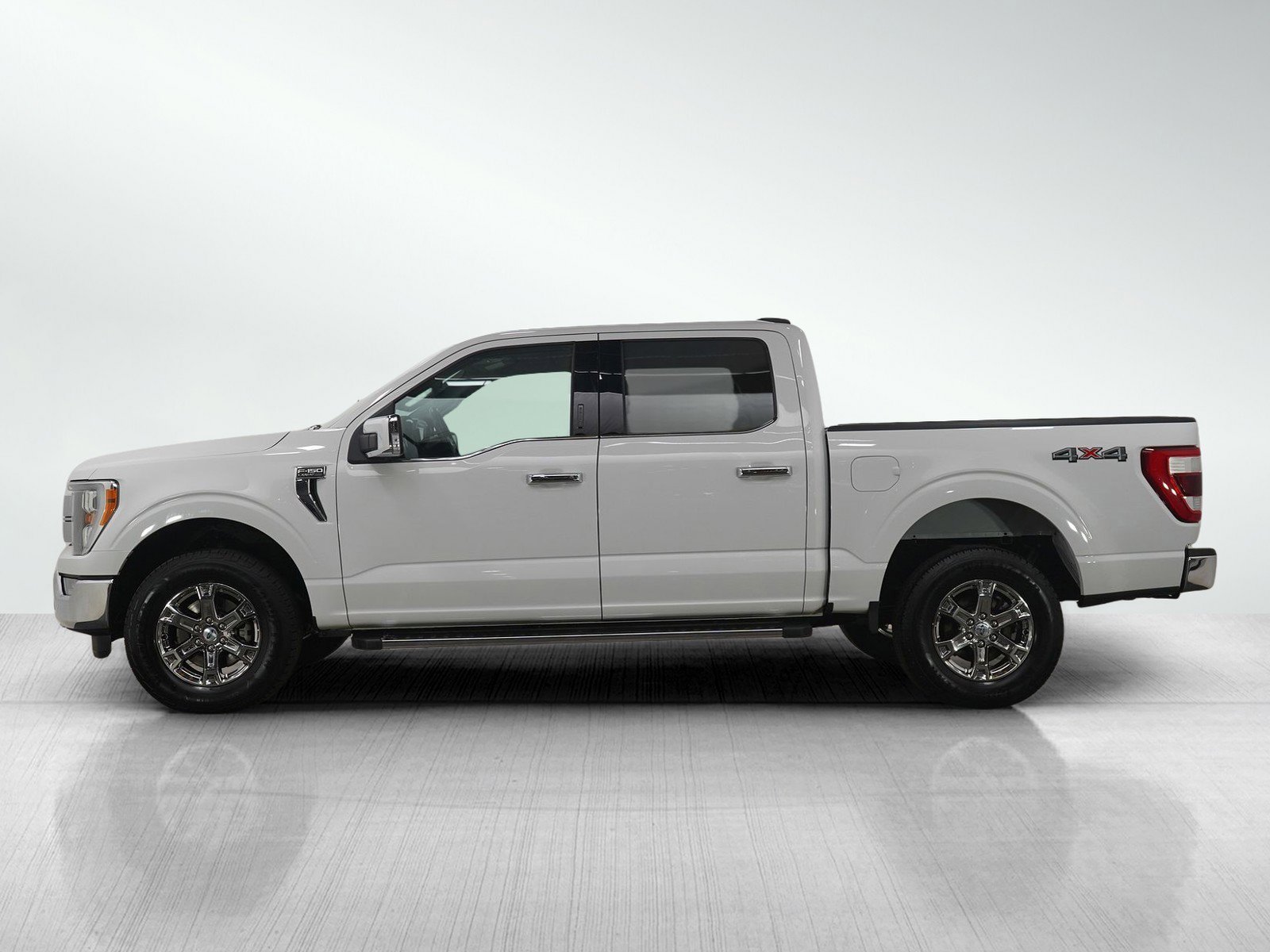 Used 2021 Ford F-150 Lariat with VIN 1FTFW1E83MFC10236 for sale in Roseville, Minnesota
