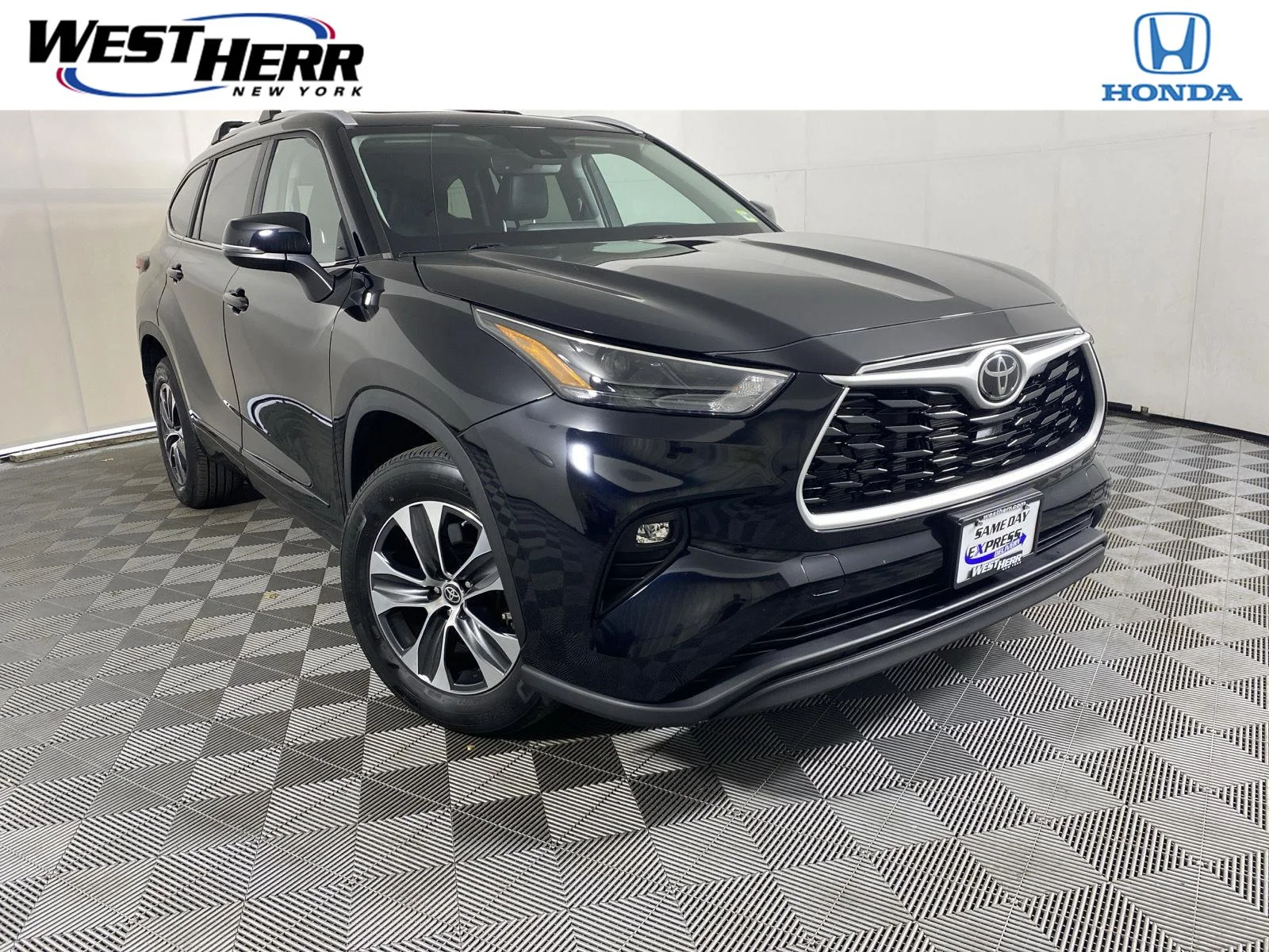 Used 2023 Midnight Black Metallic Toyota XLE image 1