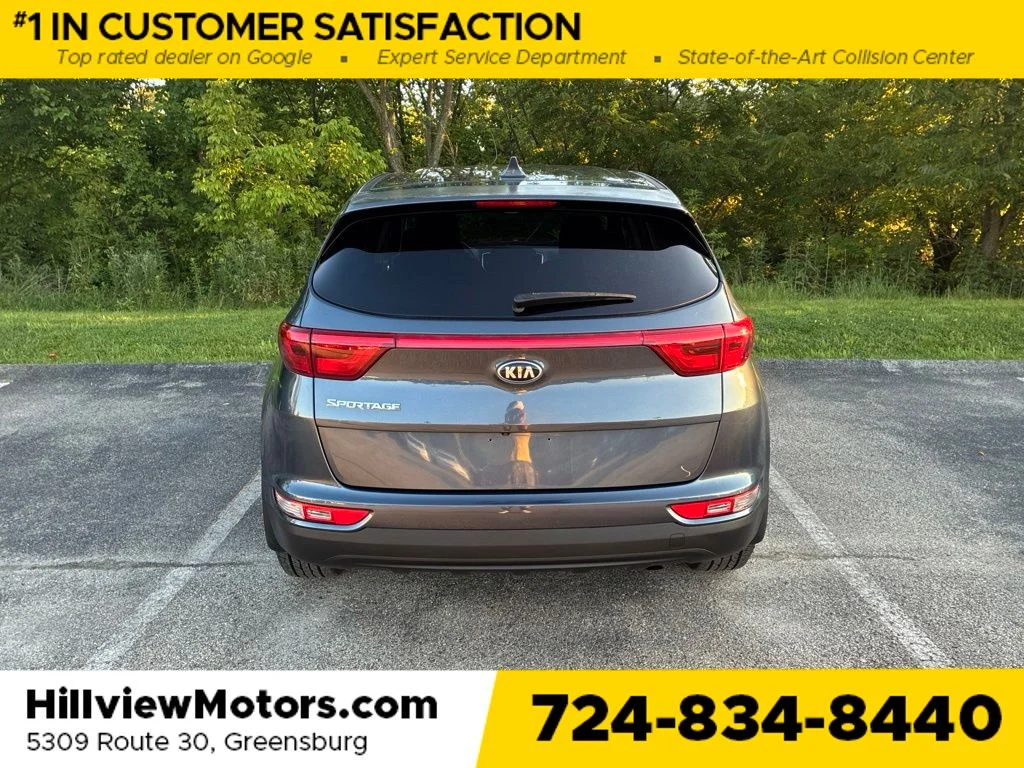 Certified Used 2019 Pacific Blue Kia LX image 4