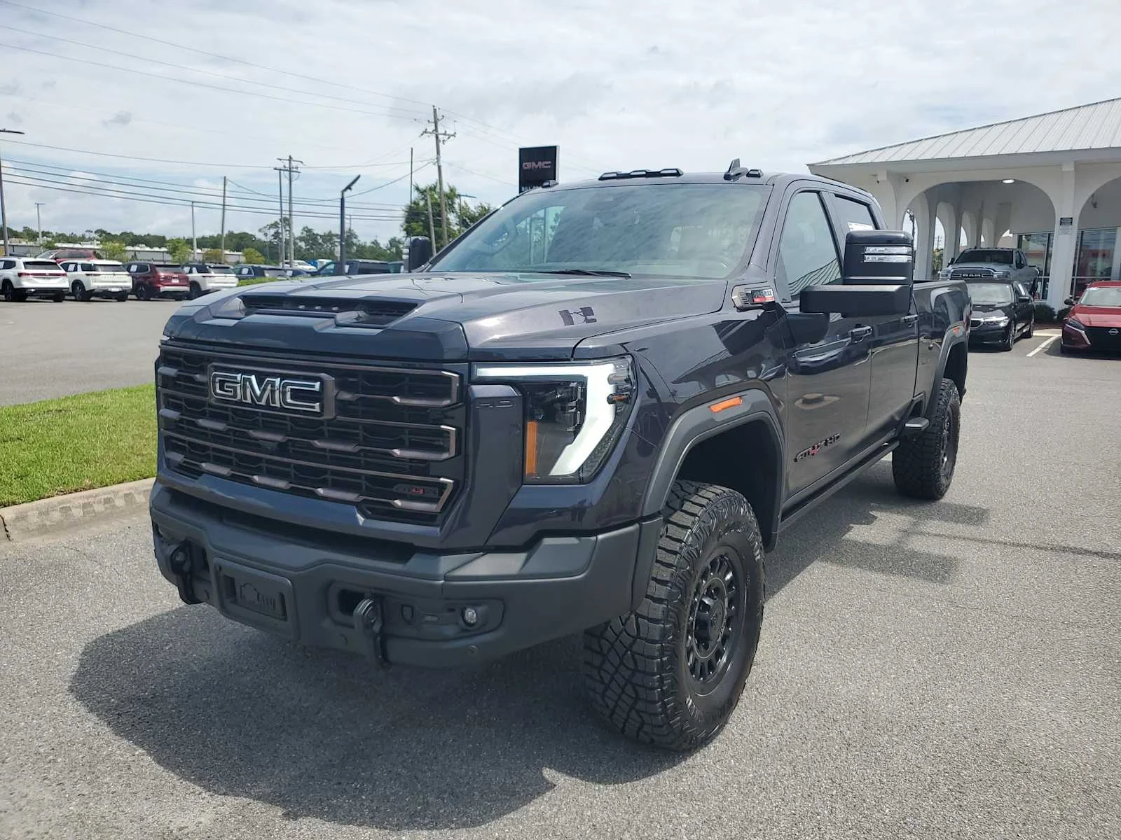 New 2026 Titanium Rush Metallic GMC AT4X image 1