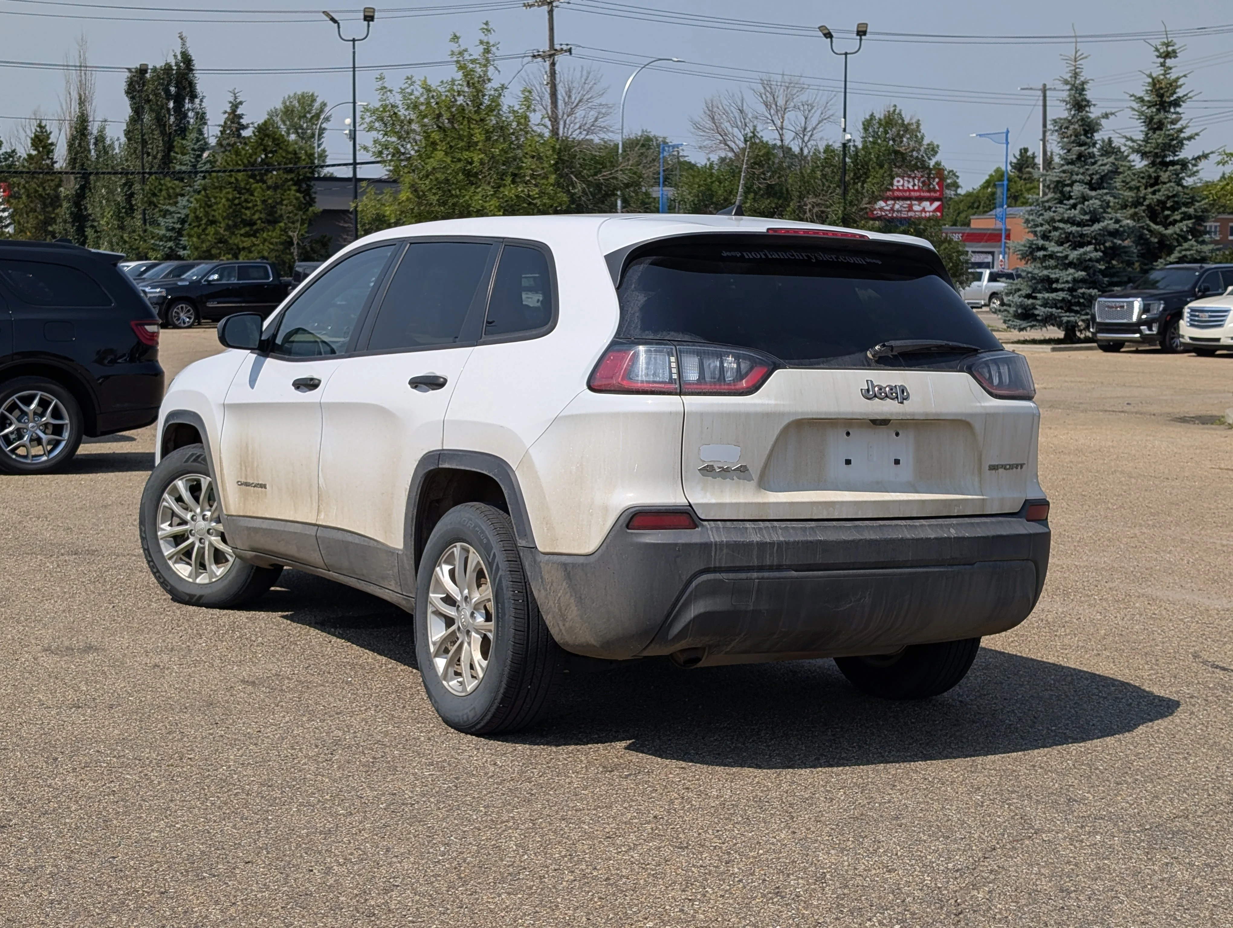 Used 2019 Bright White Jeep Sport image 4