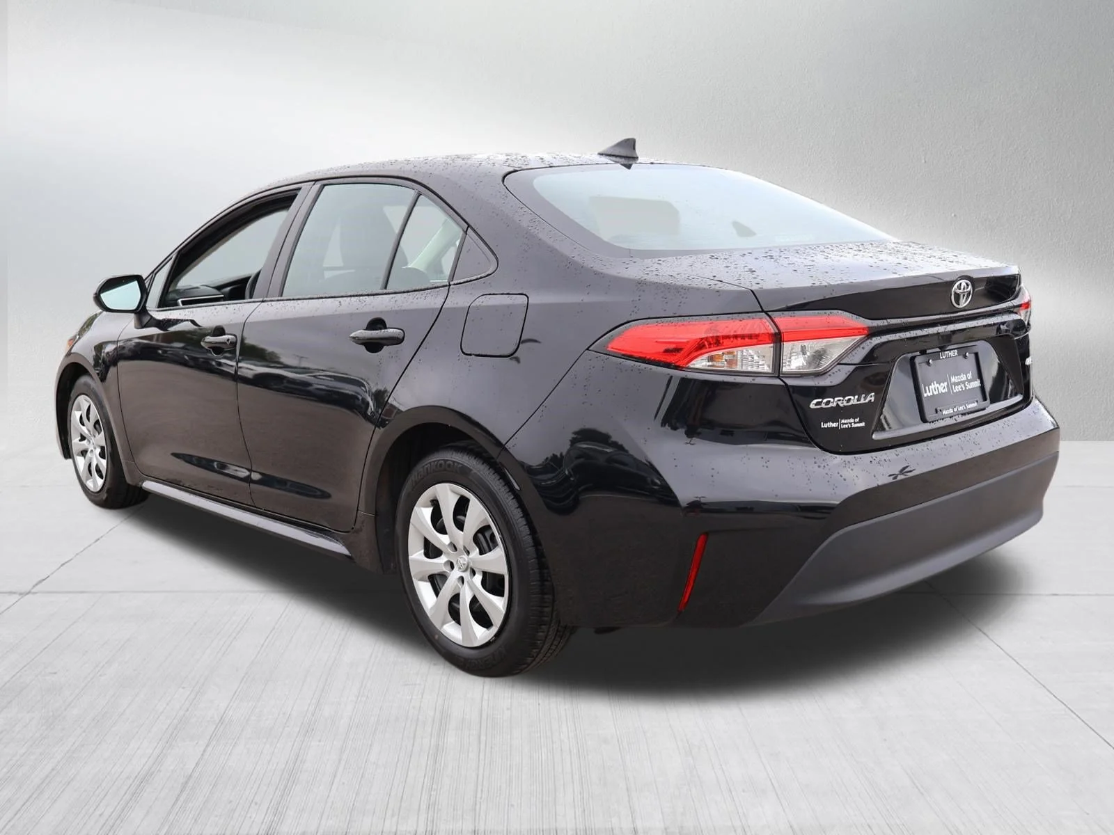 Used 2025 Midnight Black Metallic Toyota LE image 5