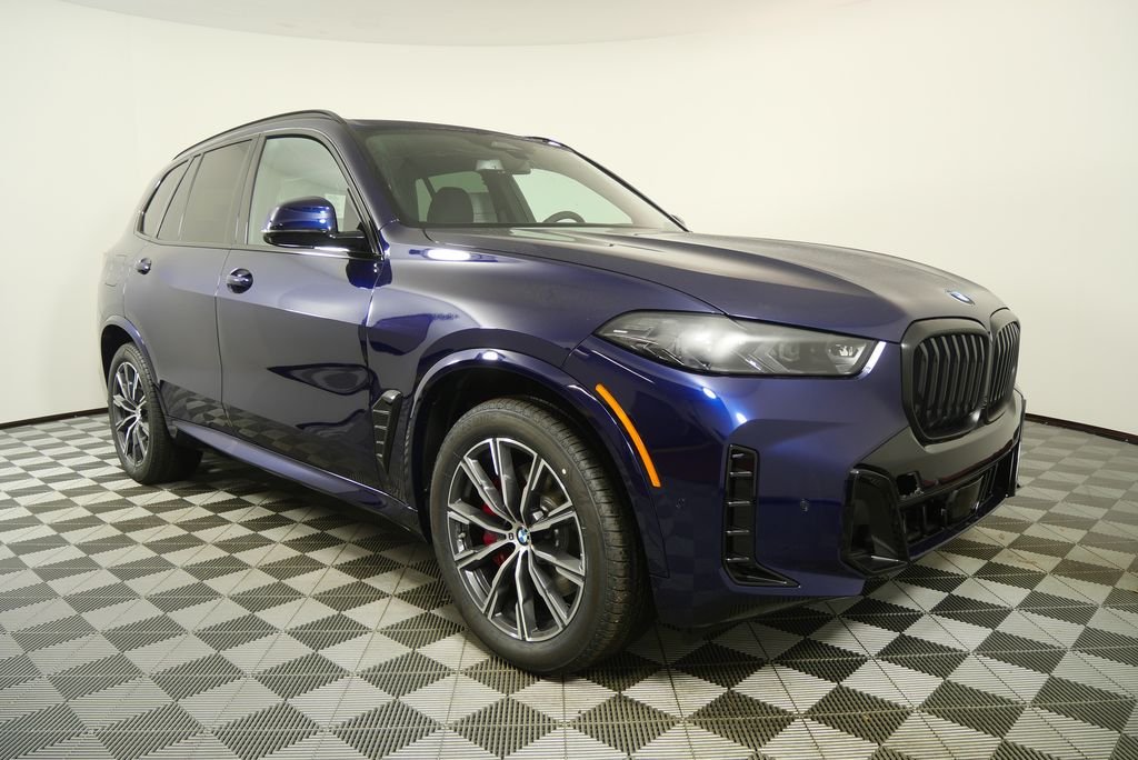 Used 2026 Tanzanite Blue II Metallic BMW xDrive40i image 8