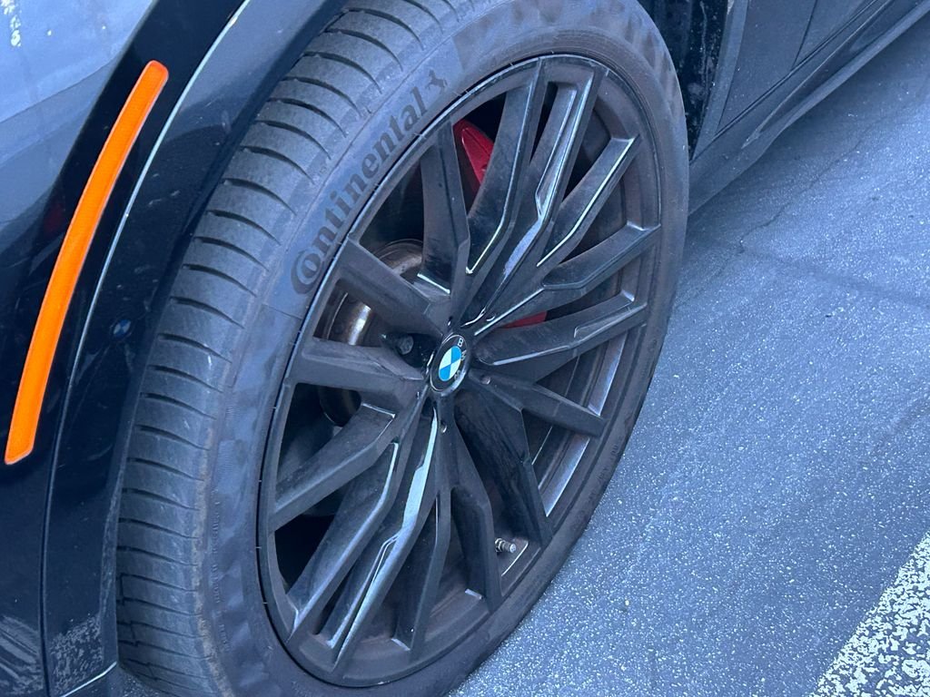 Certified Used 2024 Black Sapphire Metallic BMW xDrive40i image 3