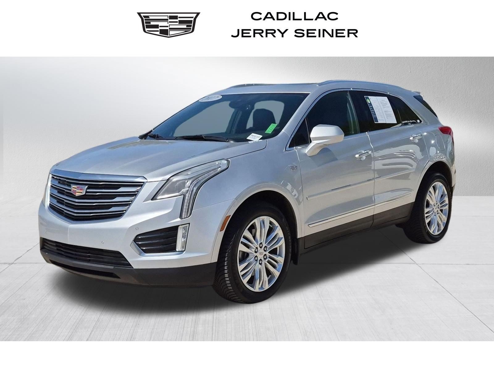Used 2017 RADIANT SILVER METALLIC Cadillac Premium Luxury FWD image 1