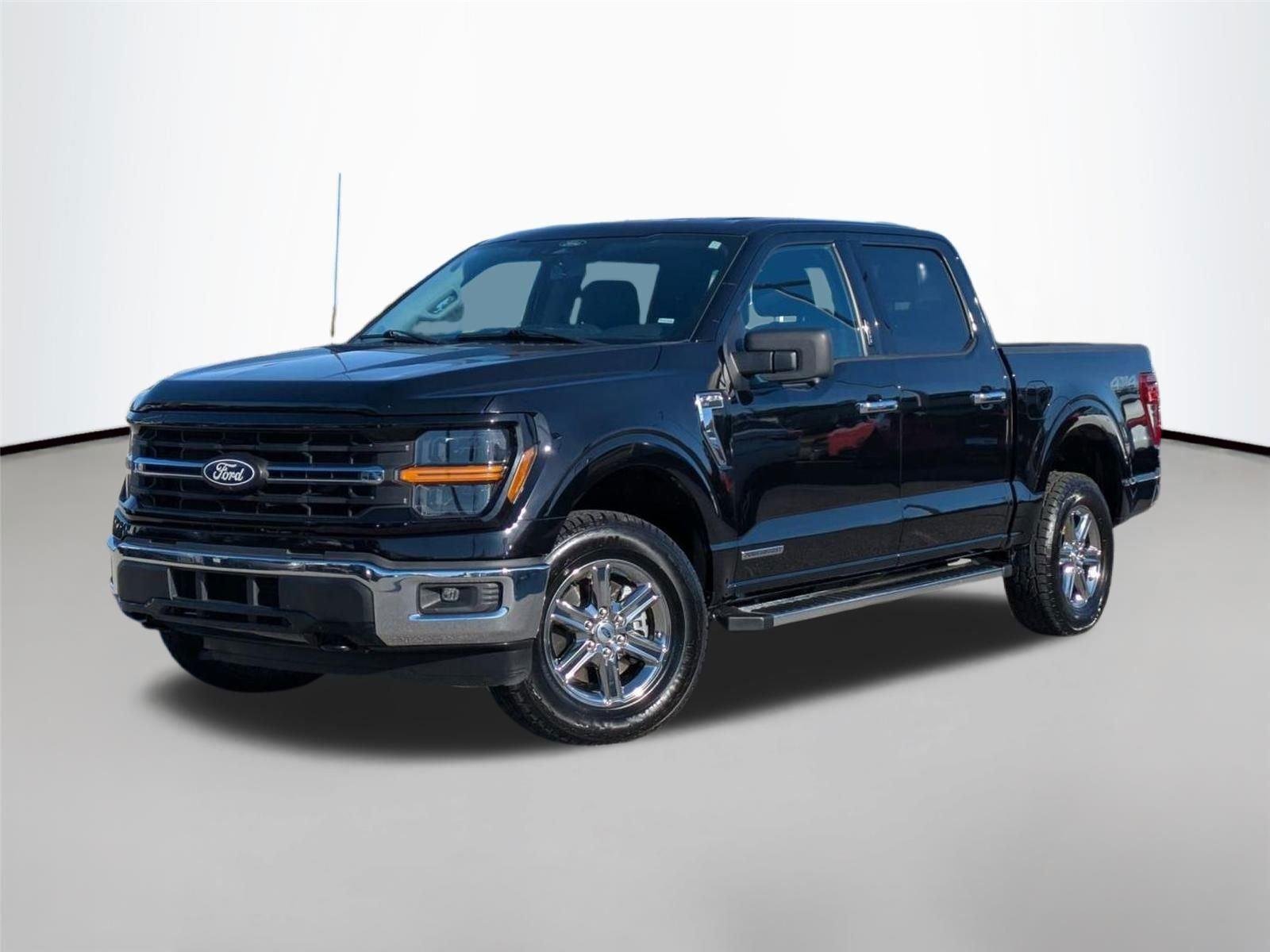 Used 2024 Agate Black Metallic Ford XLT image 1