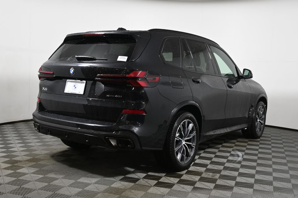 New 2026 Black Sapphire Metallic BMW xDrive40i image 7