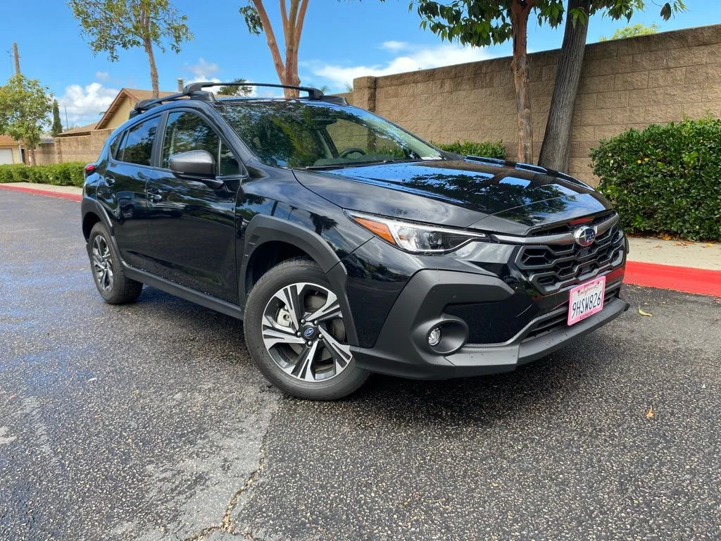 Used 2024 Black Subaru Premium image 1