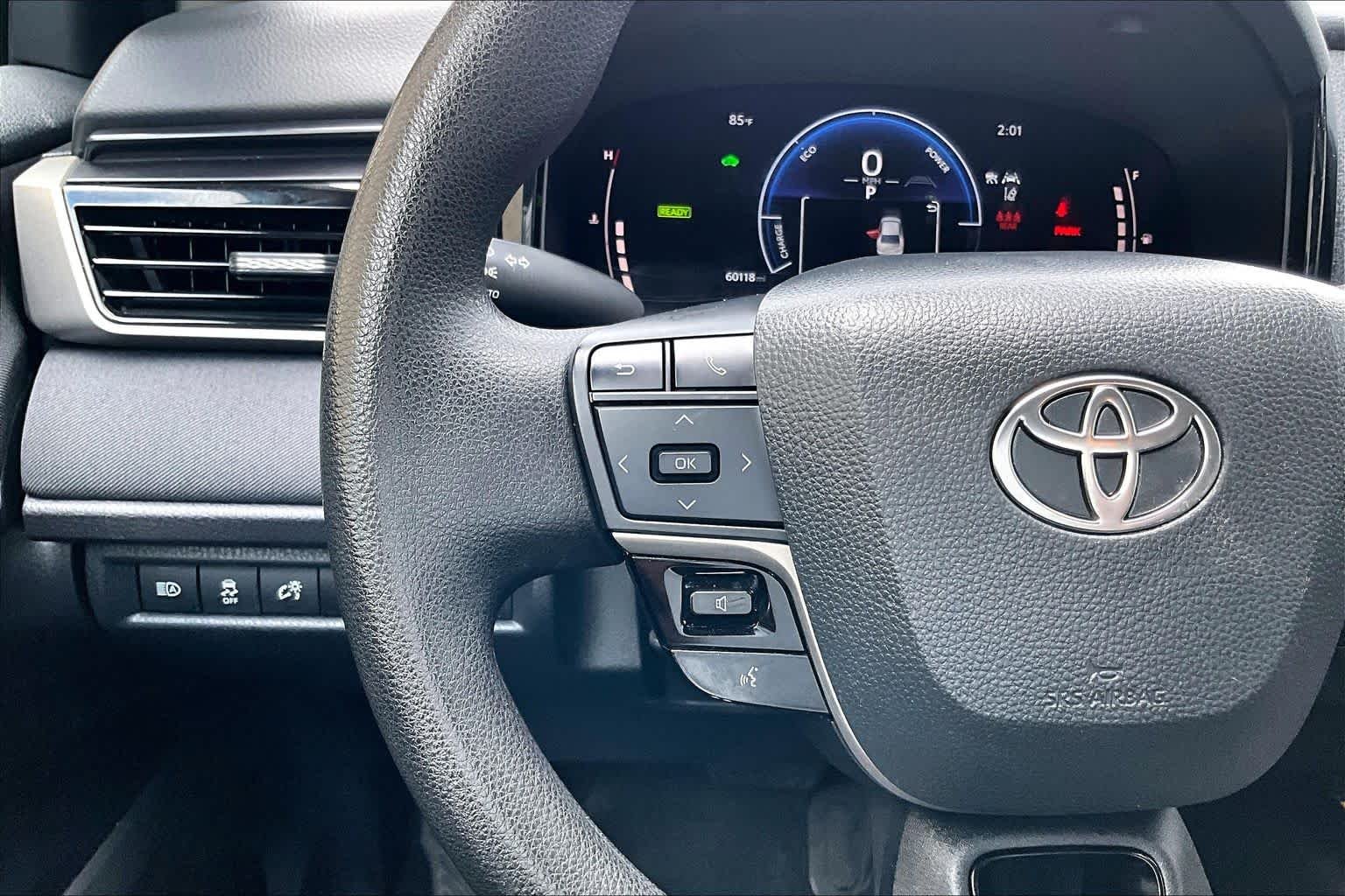 Used 2025 Reservoir Blue Toyota LE image 24