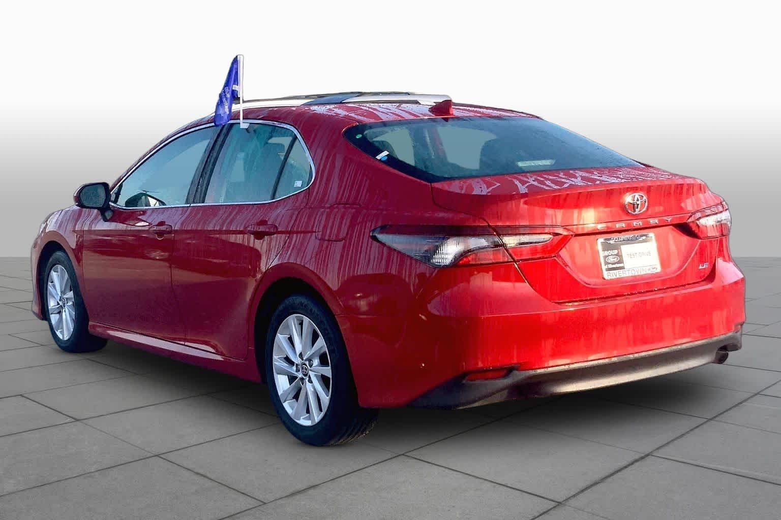 Used 2024 Supersonic Red Toyota LE image 11