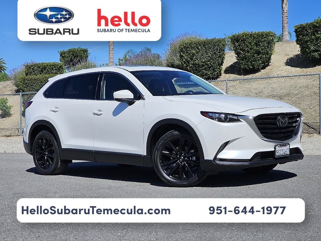 Used 2023 White Mazda Touring Plus image 1