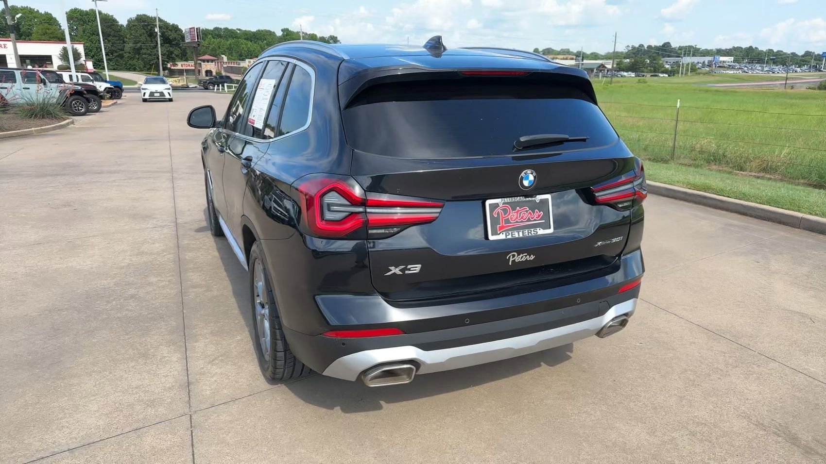 Used 2023 Black Sapphire Metallic BMW xDrive30i image 7
