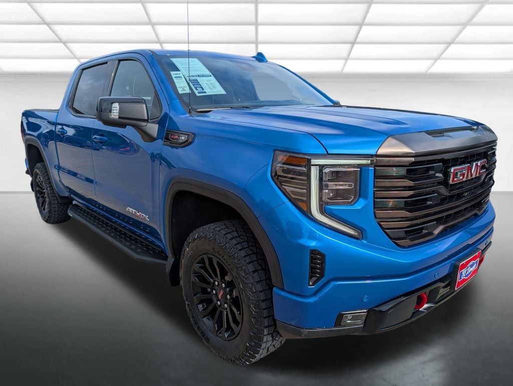 Used 2023 Dynamic Blue Metallic GMC AT4X image 1