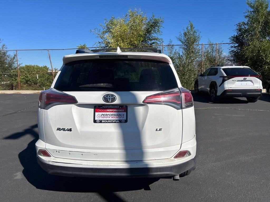 Used 2016 Super White Toyota LE image 8