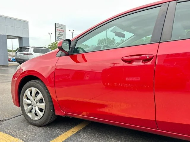 Used 2016 Barcelona Red Metallic Toyota LE image 7